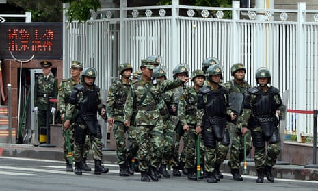 Chinese paramilitary police on patrol in Urumqi, capital of Xinjiang.