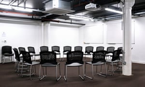 Empty chairs in a circle at an Andy's Man Club meeting