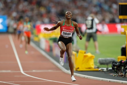 Kenya’s Hellen Onsando Obiri celebrates after winning the women’s 5,000m final.