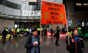 Extinction Rebellion activists protesting outside New Broadcasting House in London.