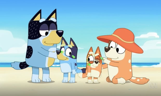 Bluey and her family at the beach, in a still from the TV show