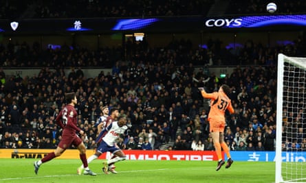 Tottenham’s Pape Sarr (in white) shoots over Ederson’s goal late on