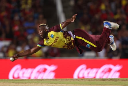 Russell fields off his own delivery against New Zealand during the ICC men’s T20 Cricket World Cup in 2024