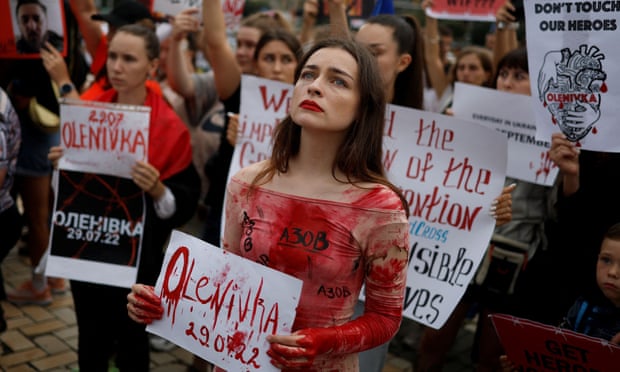 The wife of a Ukrainian serviceman who defended the Mariupol steelworks at a Kyiv rally after the Olenivka attack