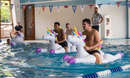 Kieran Trippier, Jordan Pickford, Jesse Lingard and Harry Maguire play with inflatable unicorns in a swimming pool during the 2018 World Cup.