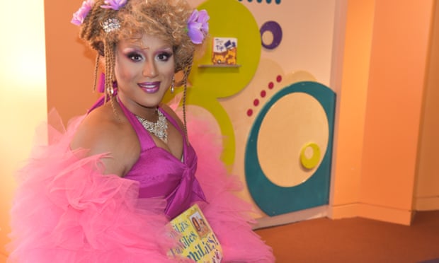 Honey Mahogany, a drag queen in San Francisco, reads stories to children at a local Drag Queen Story Hour event at the city’s public library. 