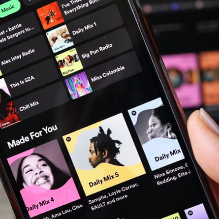 Mobile phone screen showing Spotify app.
