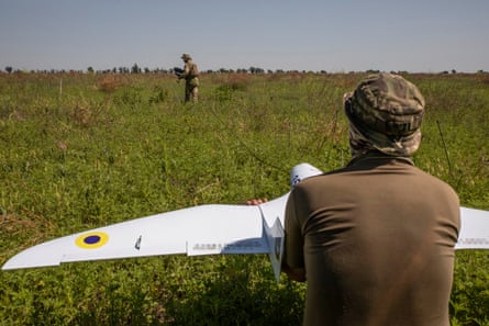 An operator ready to fly a drone near the frontline.