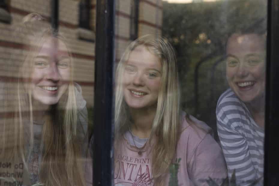 Students behind a window