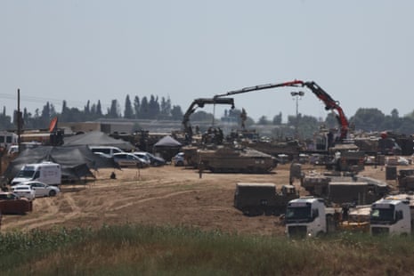 Israeli troops gather at an undisclosed location near the border with the Gaza Strip, in Israel, 7 May.