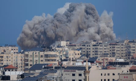 Smoke rises after an Israeli airstrike on Gaza City on Thursday.