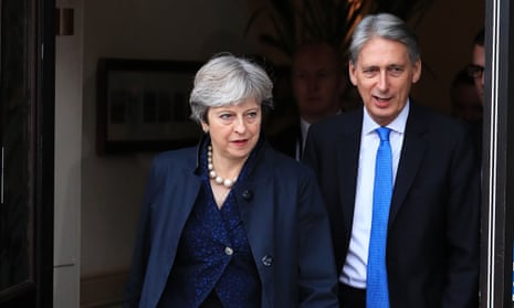 Prime minister Theresa May and the chancellor, Philip Hammond.