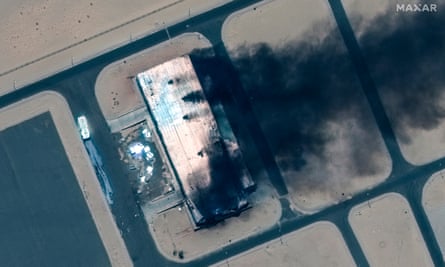 A satellite image provided by Maxar Technologies shows a burning building at Merowe airbase on 18 April.