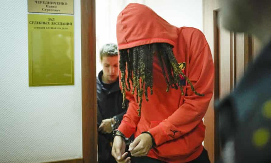 WNBA star and two-time Olympic gold medalist Brittney Griner leaves a courtroom after a hearing, in Khimki just outside Moscow, Russia.