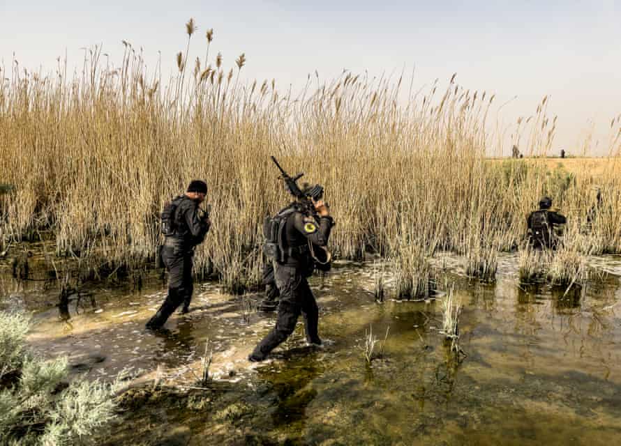 Troops comb through irrigation canals during search operations targeting Isis.