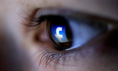 Facebook logo reflected in a woman’s eye