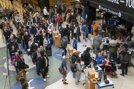 People queue to go through securityat Seattle-Tacoma International Airport in Washington last Friday.