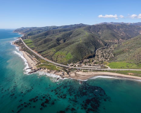 aerial view of water and a highway