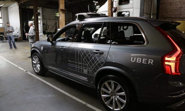An Uber driverless car is displayed in a garage in San Francisco.