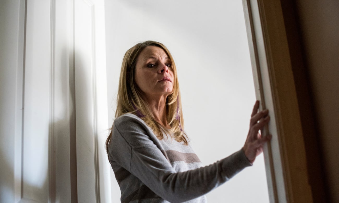 Kathleen Anduze, 55, reflects on her battle with Lewy Body Disease in the doorway of her bedroom in her Pleasant Valley, New York home. Kathleen was diagnosed with Lewy Body Disease, a form of progressive, degenerative dementia, at age 51.