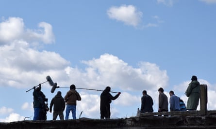 Fear of saying no … a film crew at work on a bridge.