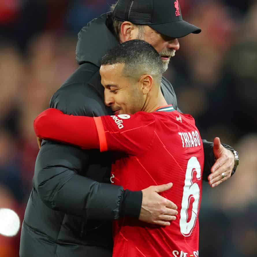 Liverpool manager Jurgen Klopp embraces player of the match Thiago Alcantara after the final whistle.