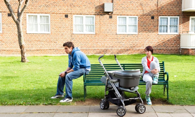 couple with pram outside flat