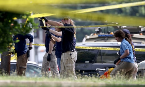 FBI investigators at the scene of the shooting on 14 June.