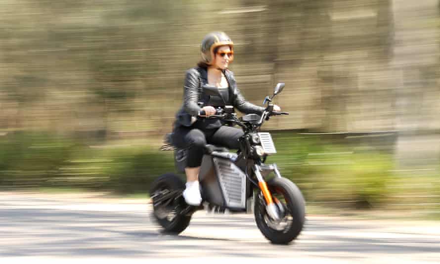 Michelle Nazzari on an electric motorcycle
