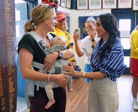 Meghan spoke to Romi Arnott with her 10-month-old daughter, Sophie as she met volunteer first responders from Bondi Surf Bathers’ Life Saving Club.