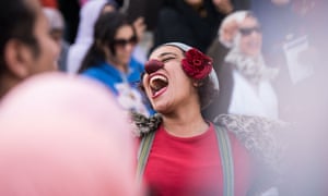 An artist performs during a demonstration against sexual harassment in Cairo.