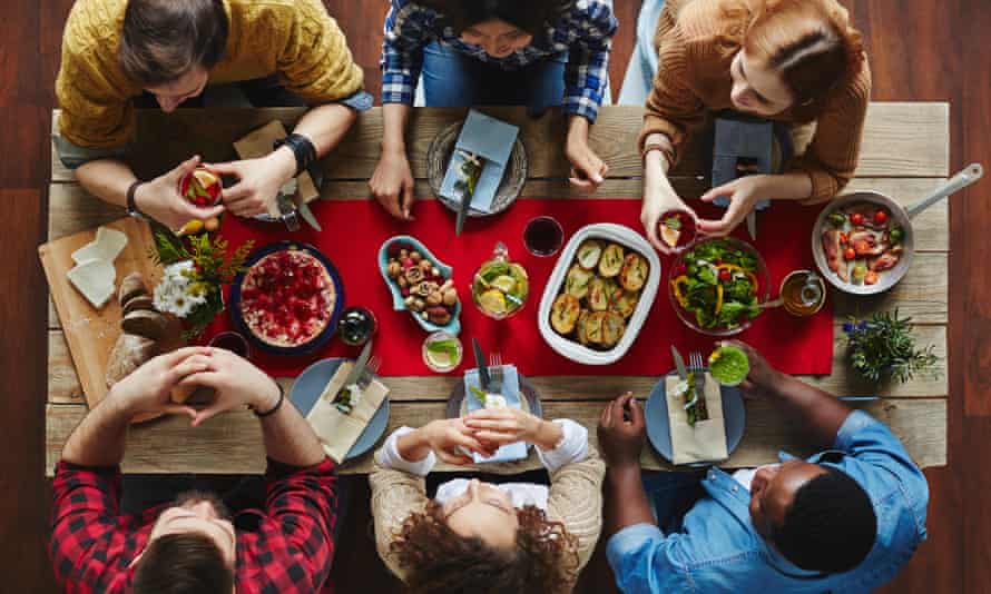 People eating food at a table