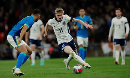 Anthony Gordon of England attacks the Brazil defence.