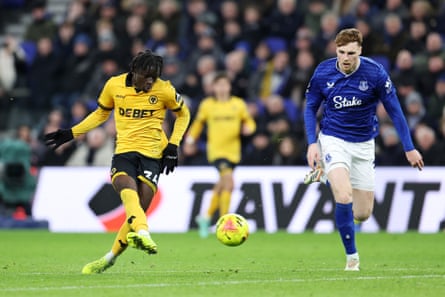 Mateus Mané shoots as an Everton defender struggles to get back in position