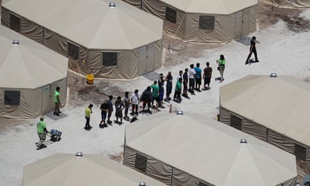 Children and workers are seen at the newly built detention camp in Tornillo, Texas, on 19 June.