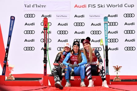 Second-placed New Zealand's Alice Robinson, winner Italy's Sofia Goggia and third-placed Lindsey Vonn celebrate on the podium on Sunday at Val-d’Isère.