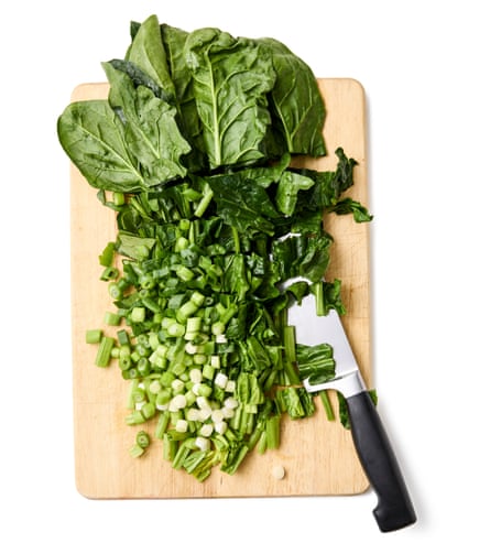 Felicity Cloake’s borek 01a. Trim and finely slice the spring onions, both the white and the green parts. Wash and trim the spinach, then finely slice it stalks and all.