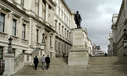 Three people on steps leading up to grand building with statue on plinth.