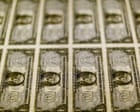 US dollar sinks to its lowest level in four years
