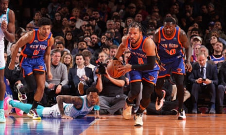 Jalen Brunson of the Knicks leads a fast break flanked by two New York team-mates during a November game at Madison Square Garden.