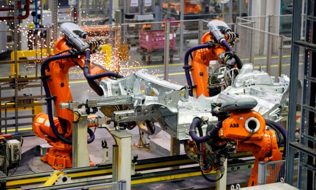 Robots assemble a Mini at the BMW plant in Cowley