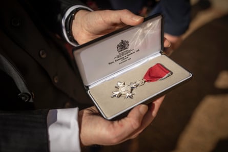Dye receiving his MBE at Windsor Castle in March