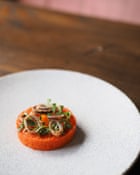 Carrot tartare, slow-cooked egg yolk, Thai aromatics, fried shallot and coriander at Alex Rushmer’s restaurant Vanderlyle, Cambridge.