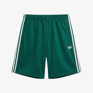 Pantalones cortos Adidas Originals firebird en verde con ribetes blancos.