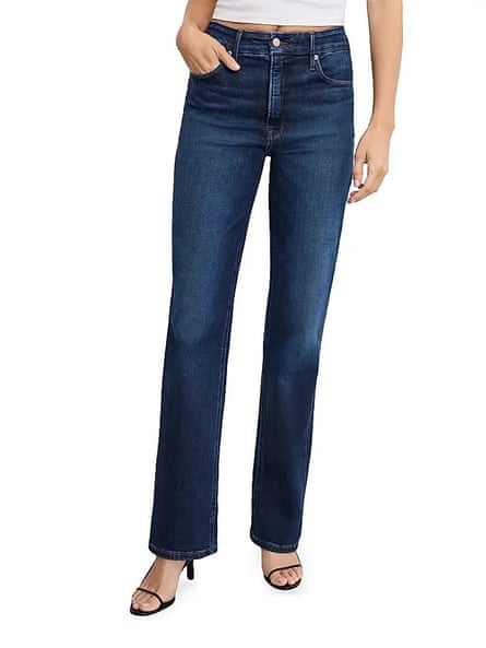 close-up of woman wearing jeans with hand in pocket