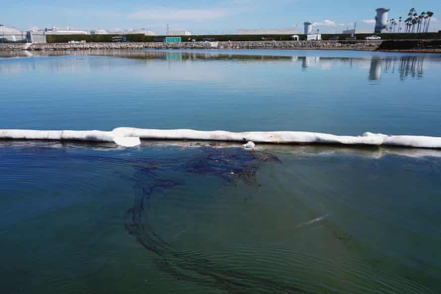 Booms placed by crews to contain oil that flowed near the Talbert Marsh and Santa Ana River mouth, during cleanup efforts after the recent spill.