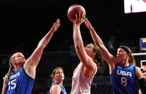 Rose Hollermann of the United States and Natalie Schneider of the United States in action with Mariska Beijer of the Netherlands.