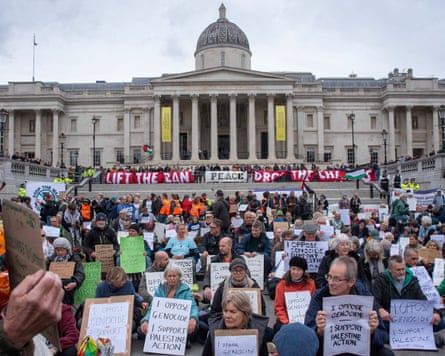 Protesters in Trafalgar Square holding placards in support of the proscribed organisation Palestine Action