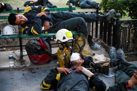 Rescue crew rest in Havana.
