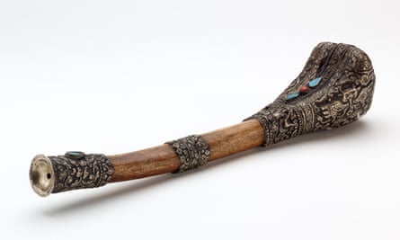 A kangling, a trumpet of made from a human thigh bone.